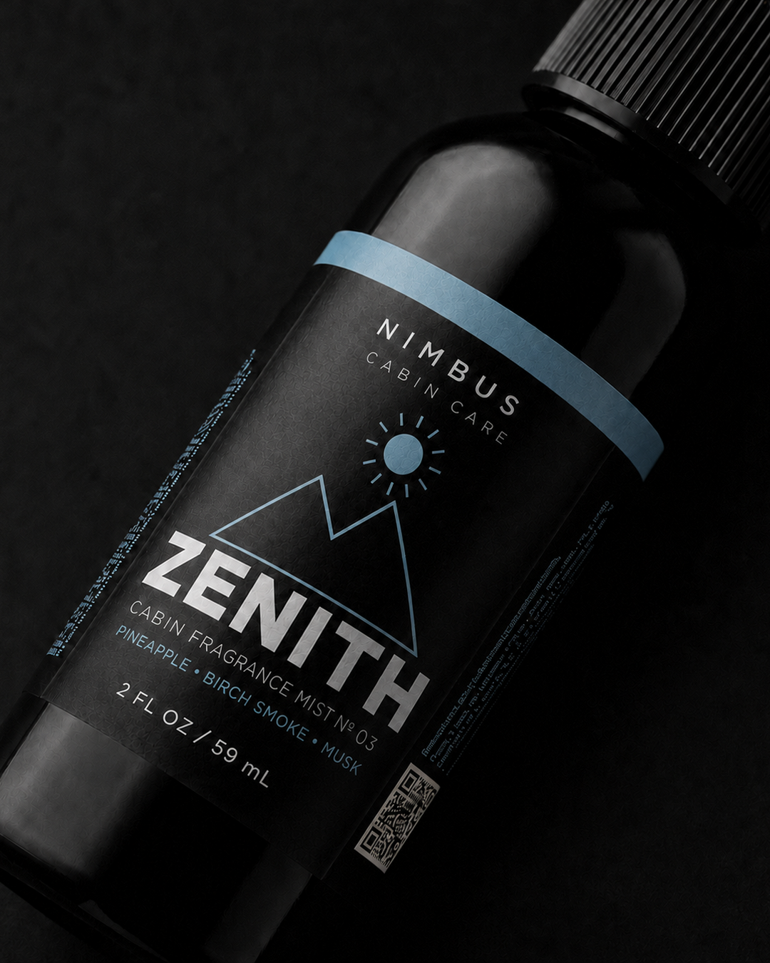 Close-up of the NIMBUS Zenith label with notes of pineapple, birch smoke and musk